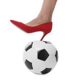 Photo of Woman in high heeled shoe with soccer ball on white background, closeup