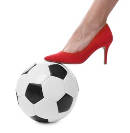 Photo of Woman in high heeled shoe with soccer ball on white background, closeup