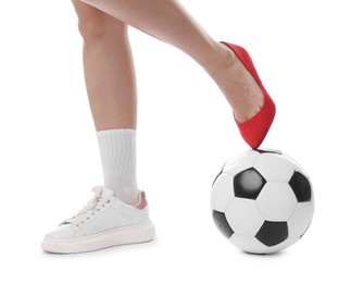 Photo of Woman in high heeled shoe and sneaker with soccer ball on white background, closeup