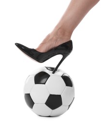 Photo of Woman in high heeled shoe with soccer ball on white background, closeup