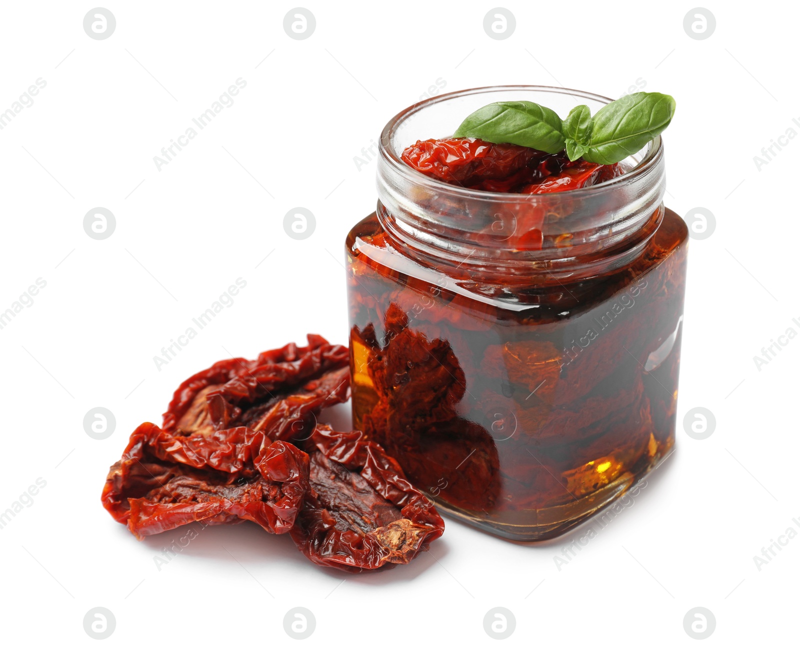Tasty sun dried tomatoes and fresh basil isolated on white Photo of Tasty sun dried tomatoes and fresh basil isolated on white