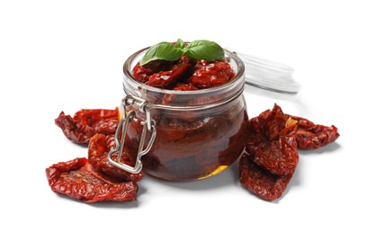 Photo of Tasty sun dried tomatoes and fresh basil isolated on white