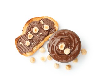 Photo of Toast with tasty chocolate spread and hazelnuts isolated on white, top view
