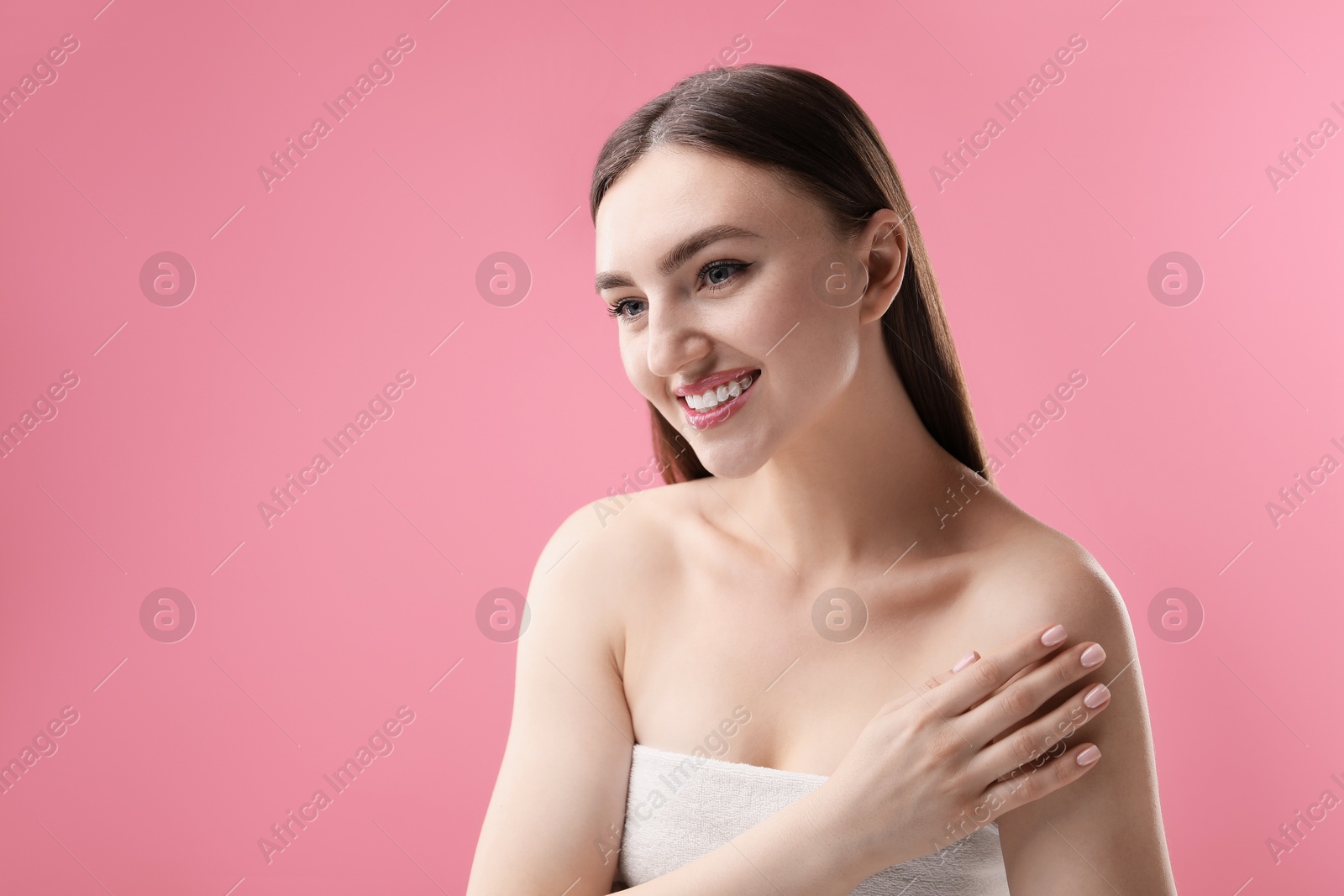 Portrait of beautiful woman on pink background. Space for text Photo of Portrait of beautiful woman on pink background. Space for text