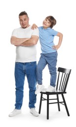 Photo of Father with his son on white background