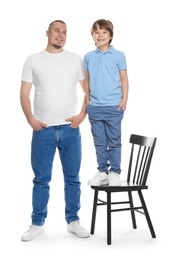 Photo of Father with his son on white background