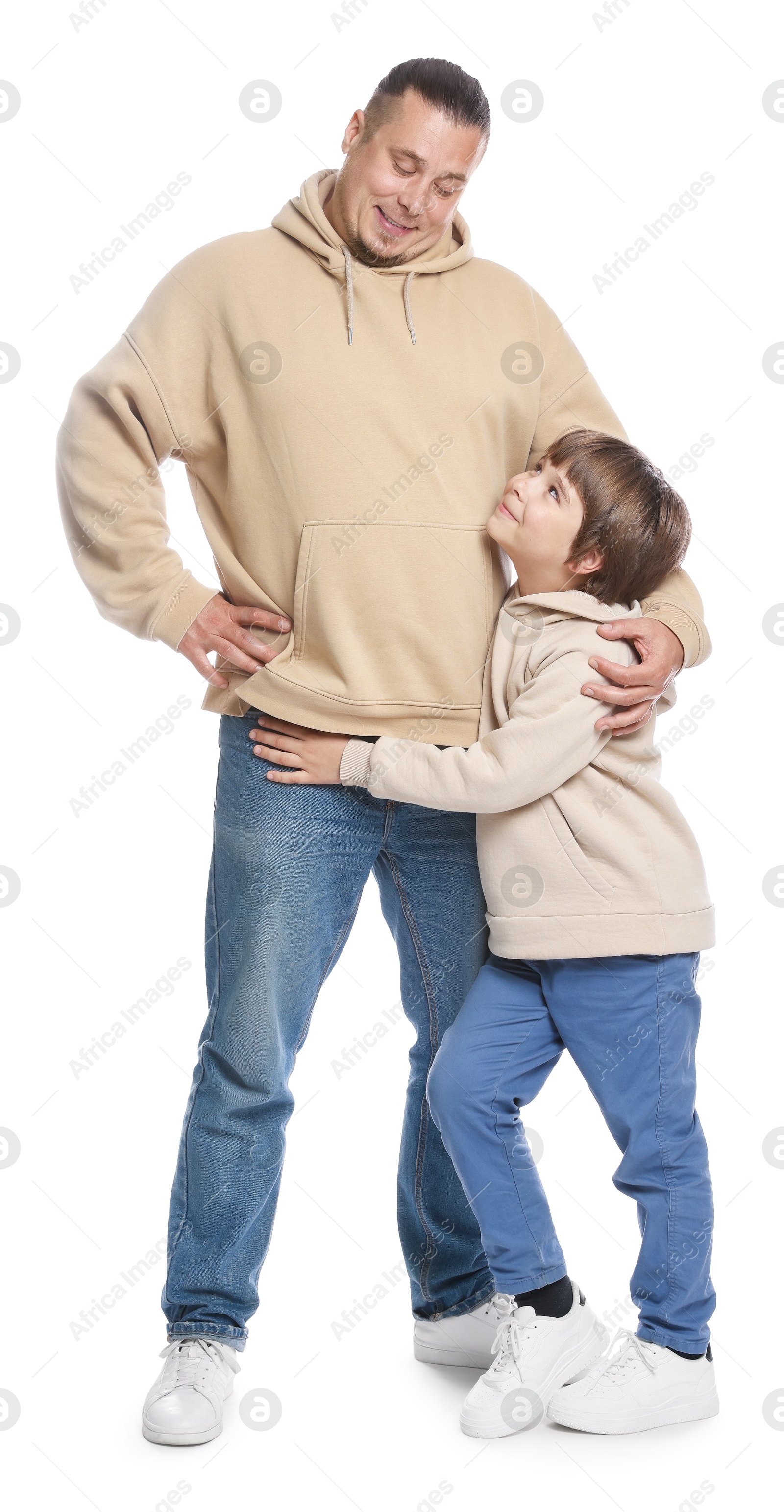 Father with his son on white background Photo of Father with his son on white background