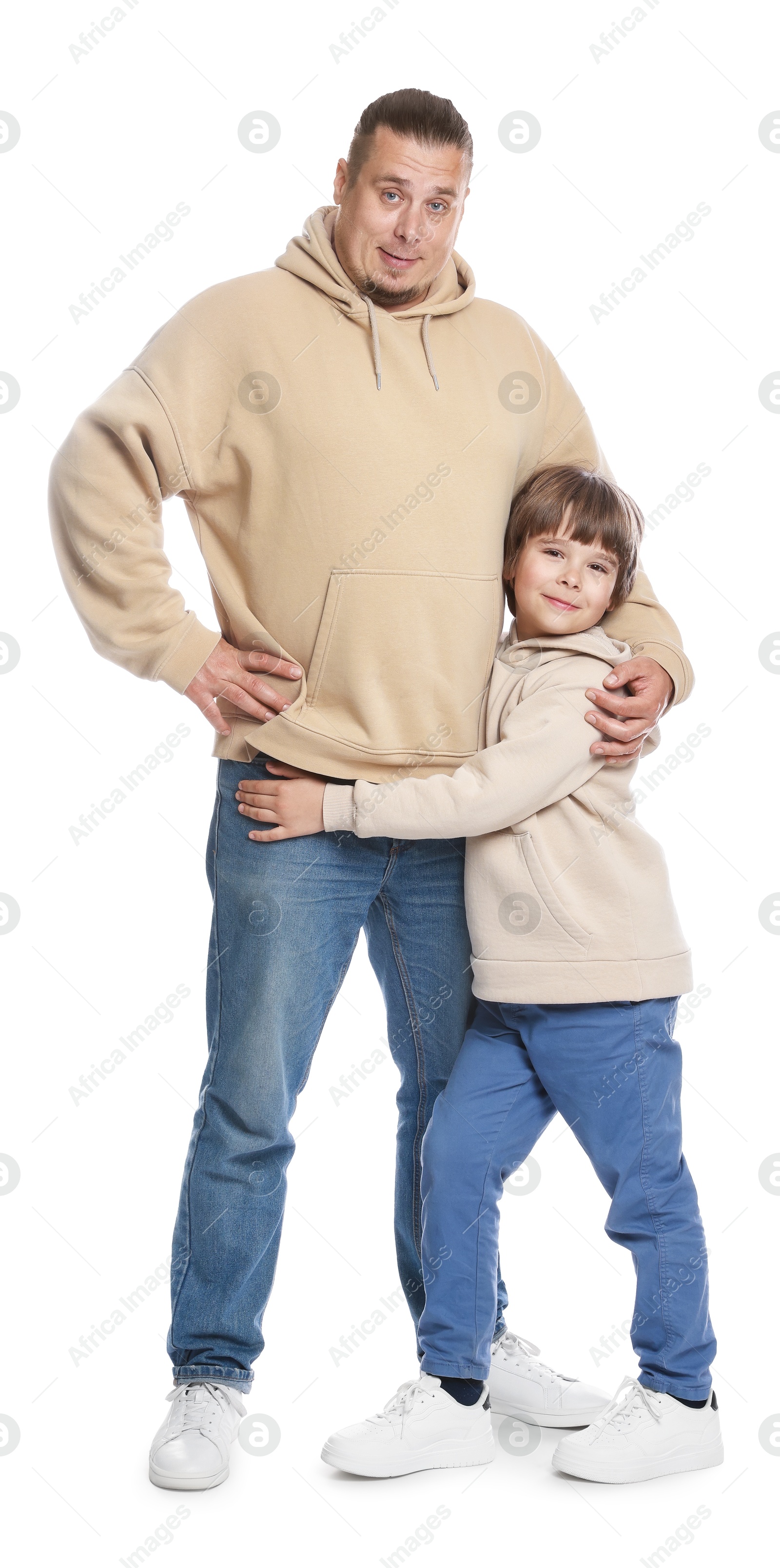 Father with his son on white background Photo of Father with his son on white background