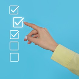 Image of Approved. Woman touching check mark on virtual screen against light blue background, closeup