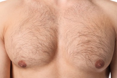 Photo of Young man with hairy chest, closeup. Epilation procedure