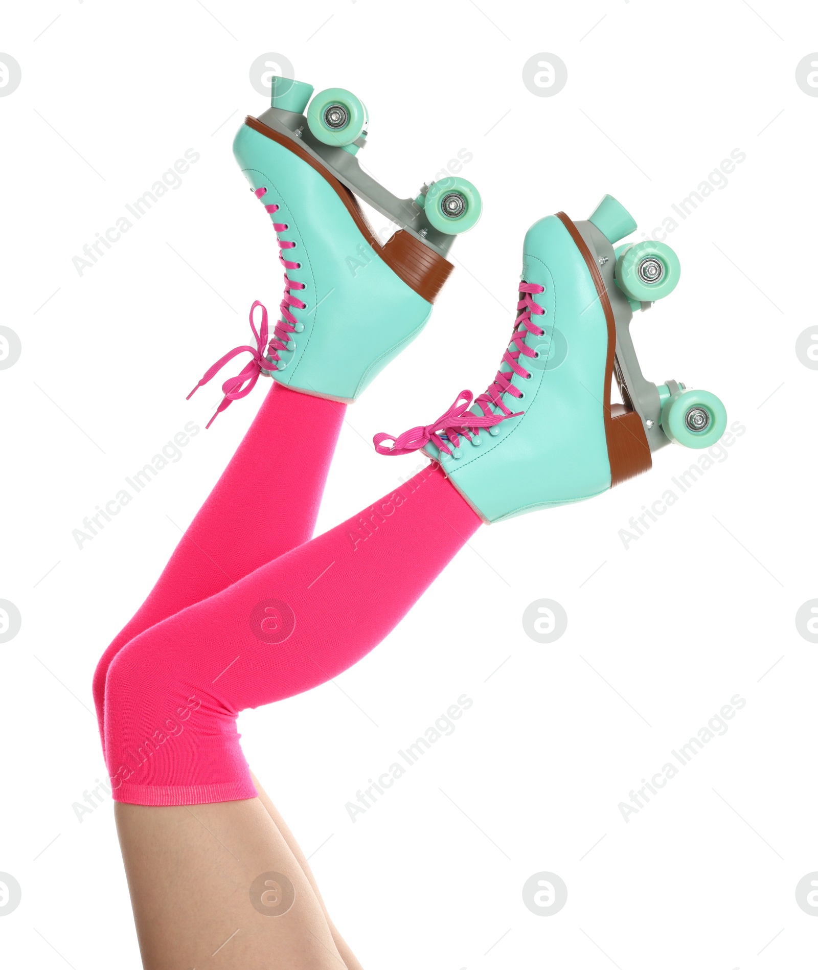 Woman in roller skates on white background, closeup Photo of Woman in roller skates on white background, closeup