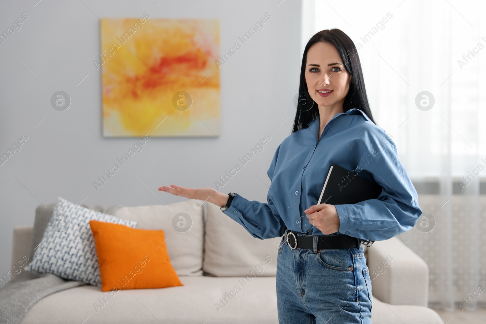 Portrait of professional psychologist with notebook in office Photo of Portrait of professional psychologist with notebook in office