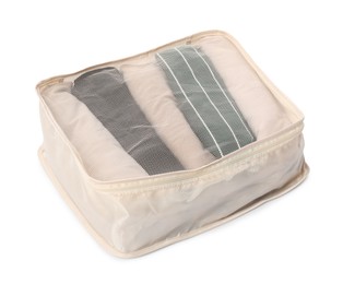 Photo of One packing cube with folded clothes isolated on white