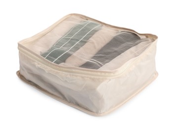 Photo of One packing cube with folded clothes isolated on white