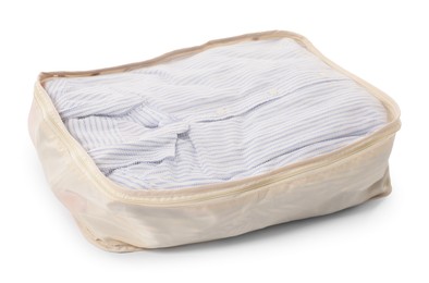 Photo of One packing cube with folded clothes isolated on white