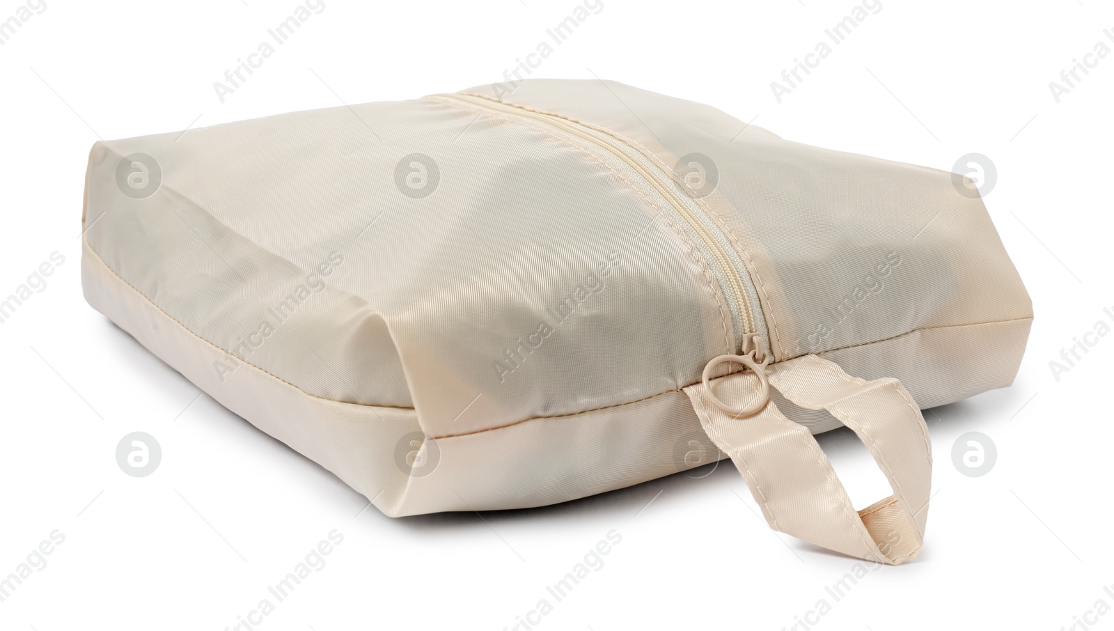 One beige packing cube isolated on white Photo of One beige packing cube isolated on white