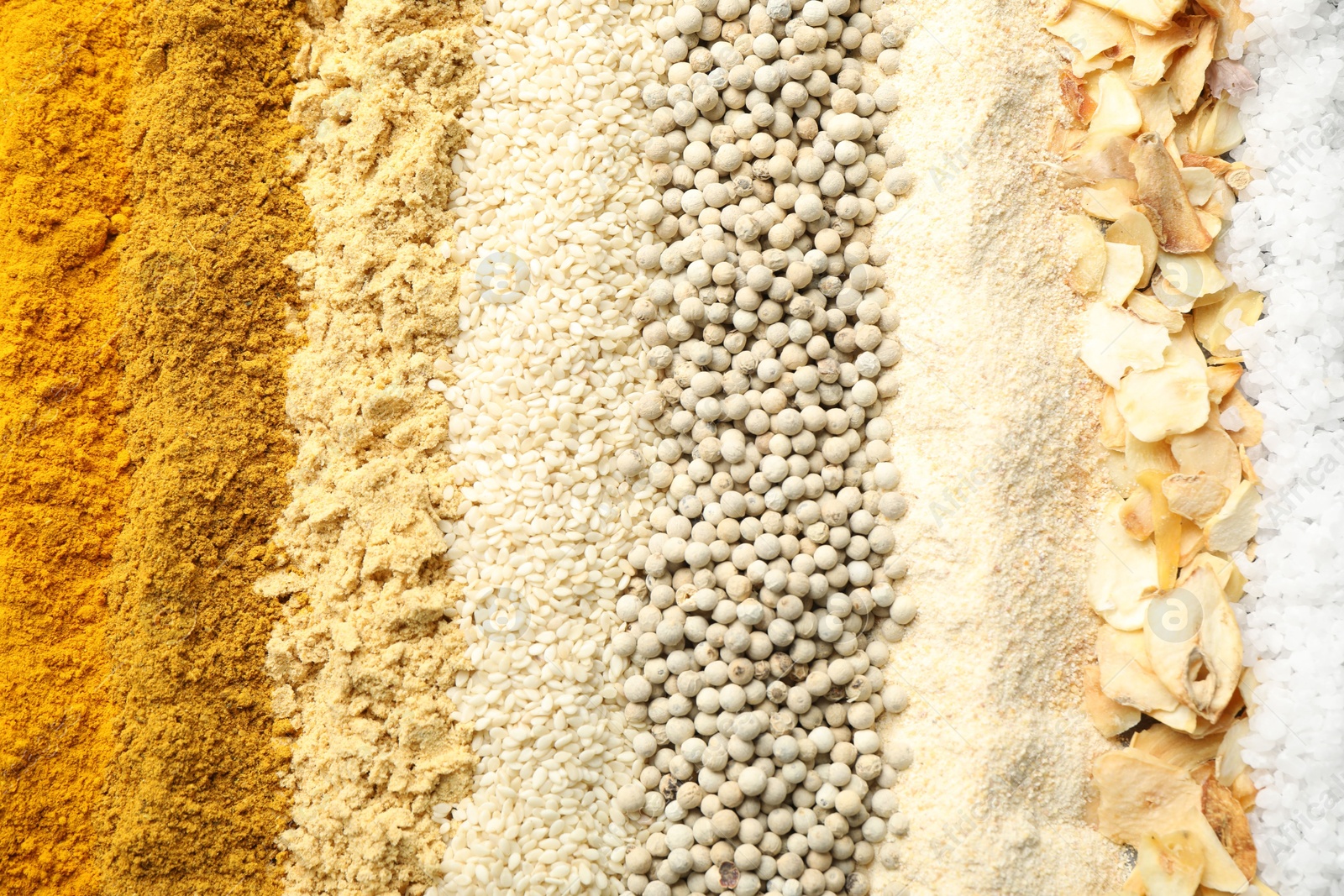Many different spices as background, top view Photo of Many different spices as background, top view