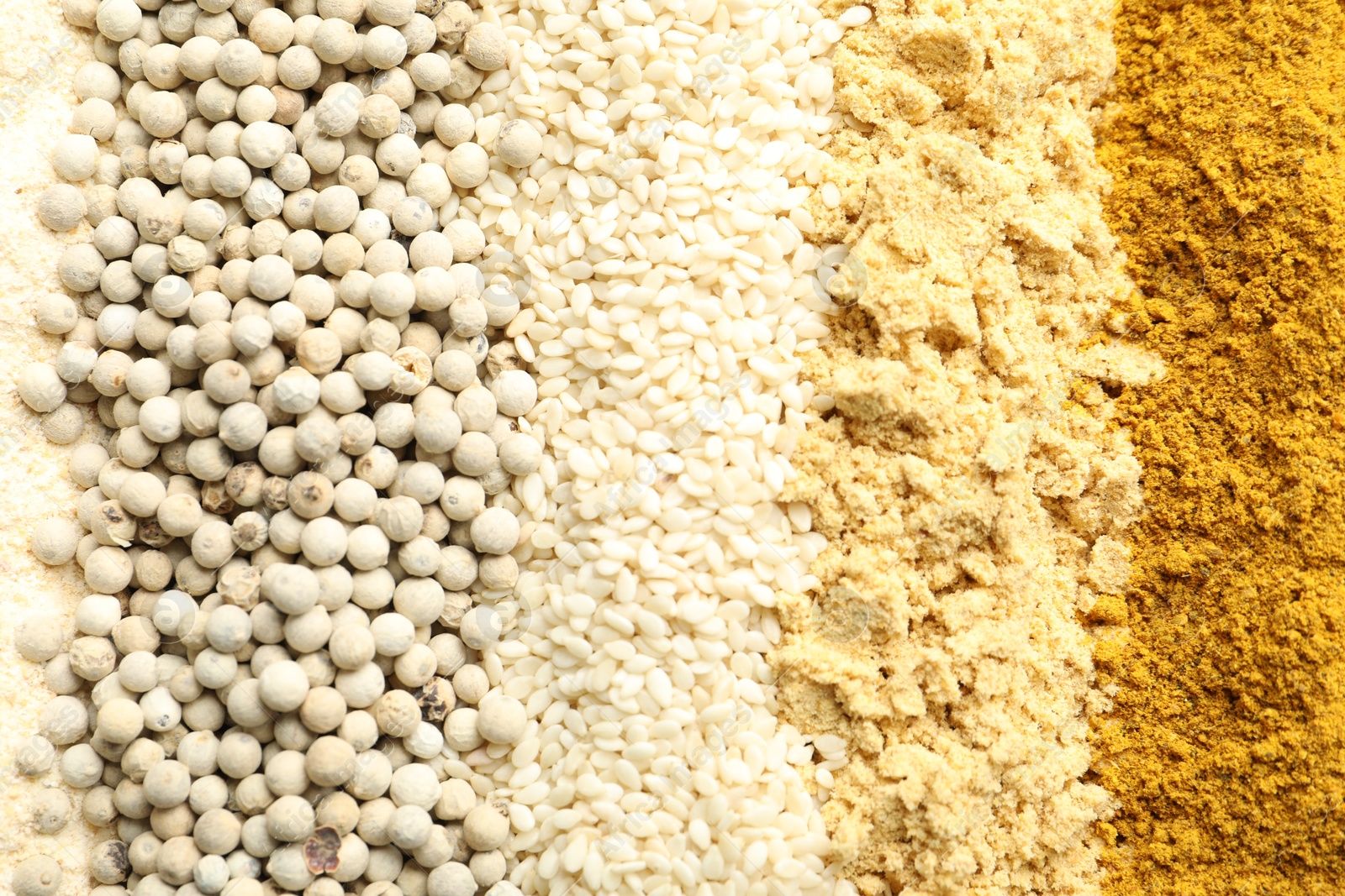 Many different spices as background, top view Photo of Many different spices as background, top view
