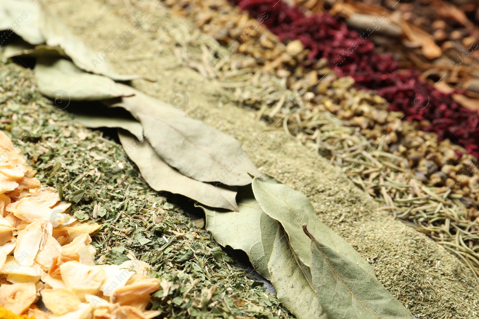 Many different spices as background, closeup view Photo of Many different spices as background, closeup view
