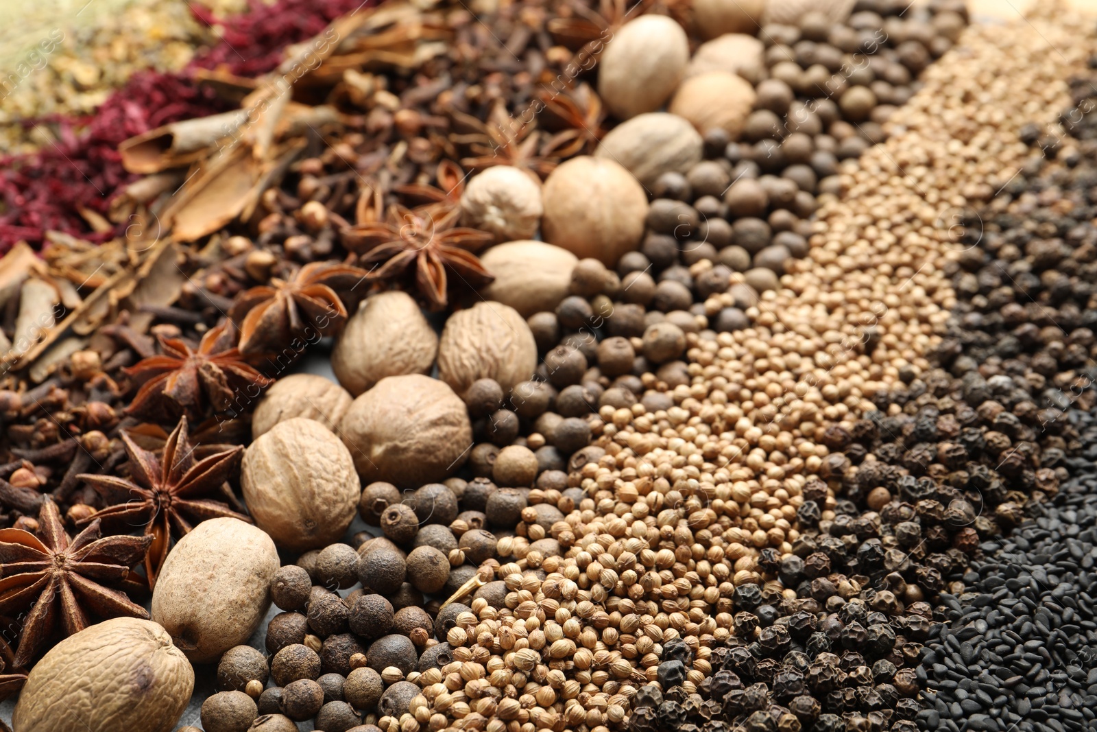 Many different spices as background, closeup view Photo of Many different spices as background, closeup view