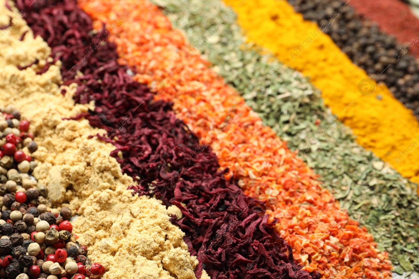 Many different spices as background, closeup view Photo of Many different spices as background, closeup view