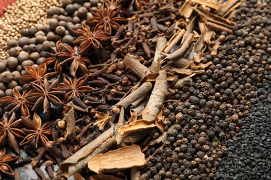 Photo of Many different spices as background, closeup view