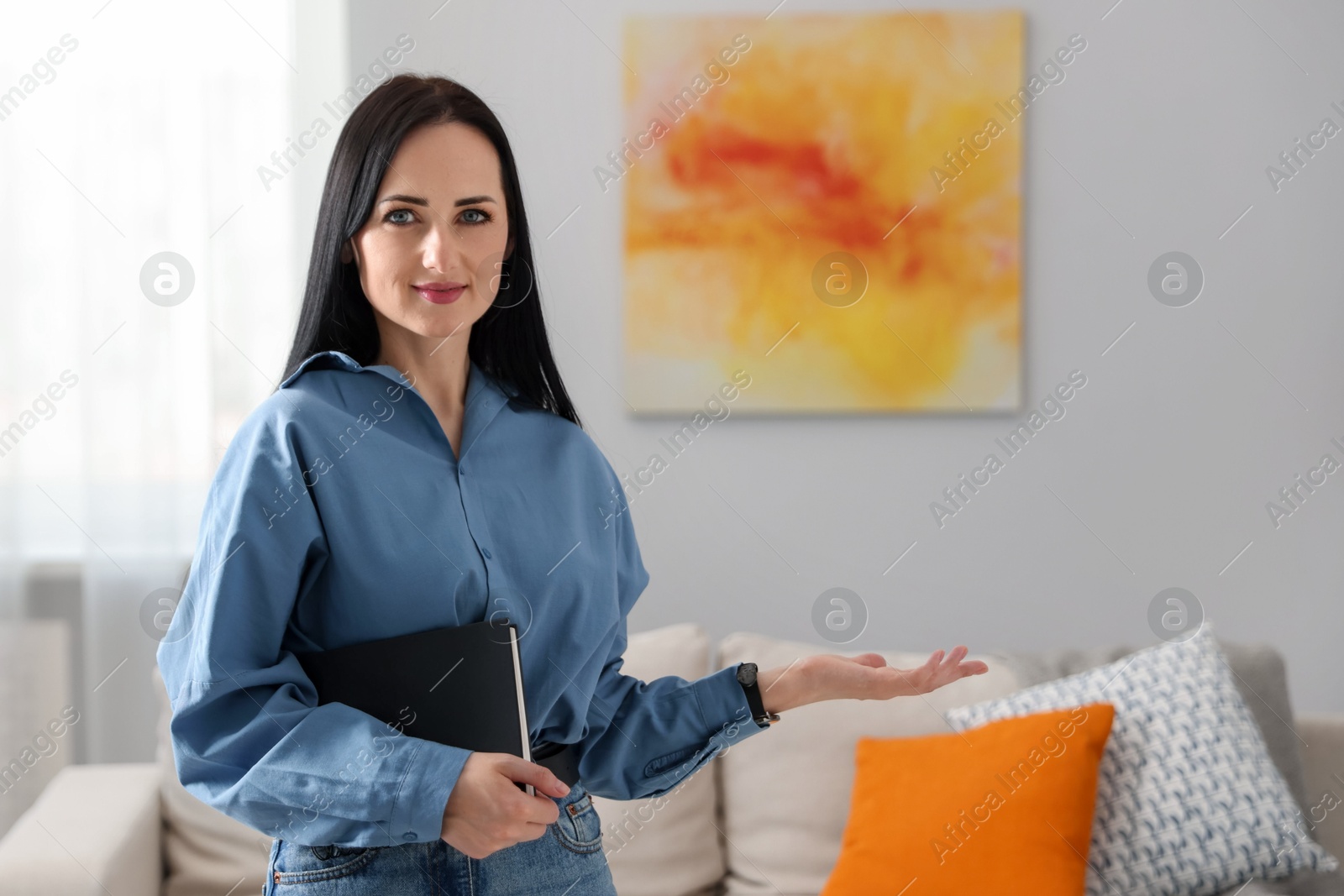 Professional psychologist with notebook in office, space for text Photo of Professional psychologist with notebook in office, space for text