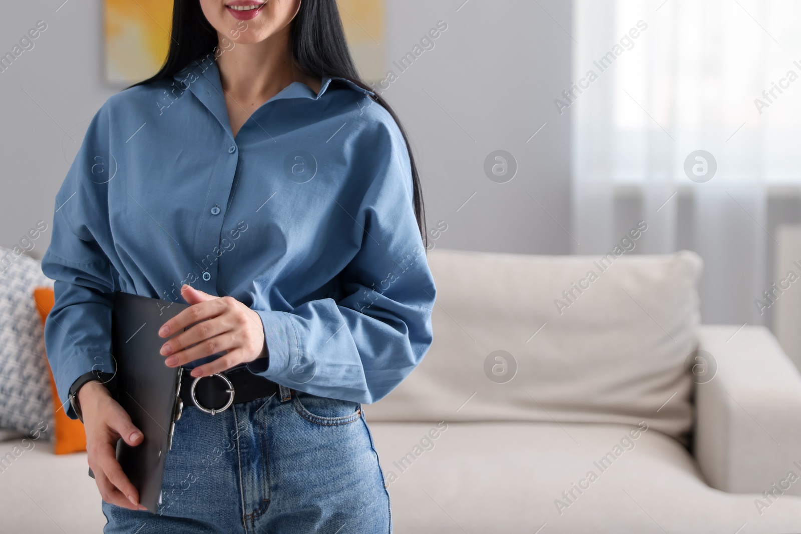 Professional psychologist with clipboard in office, closeup. Space for text Photo of Professional psychologist with clipboard in office, closeup. Space for text