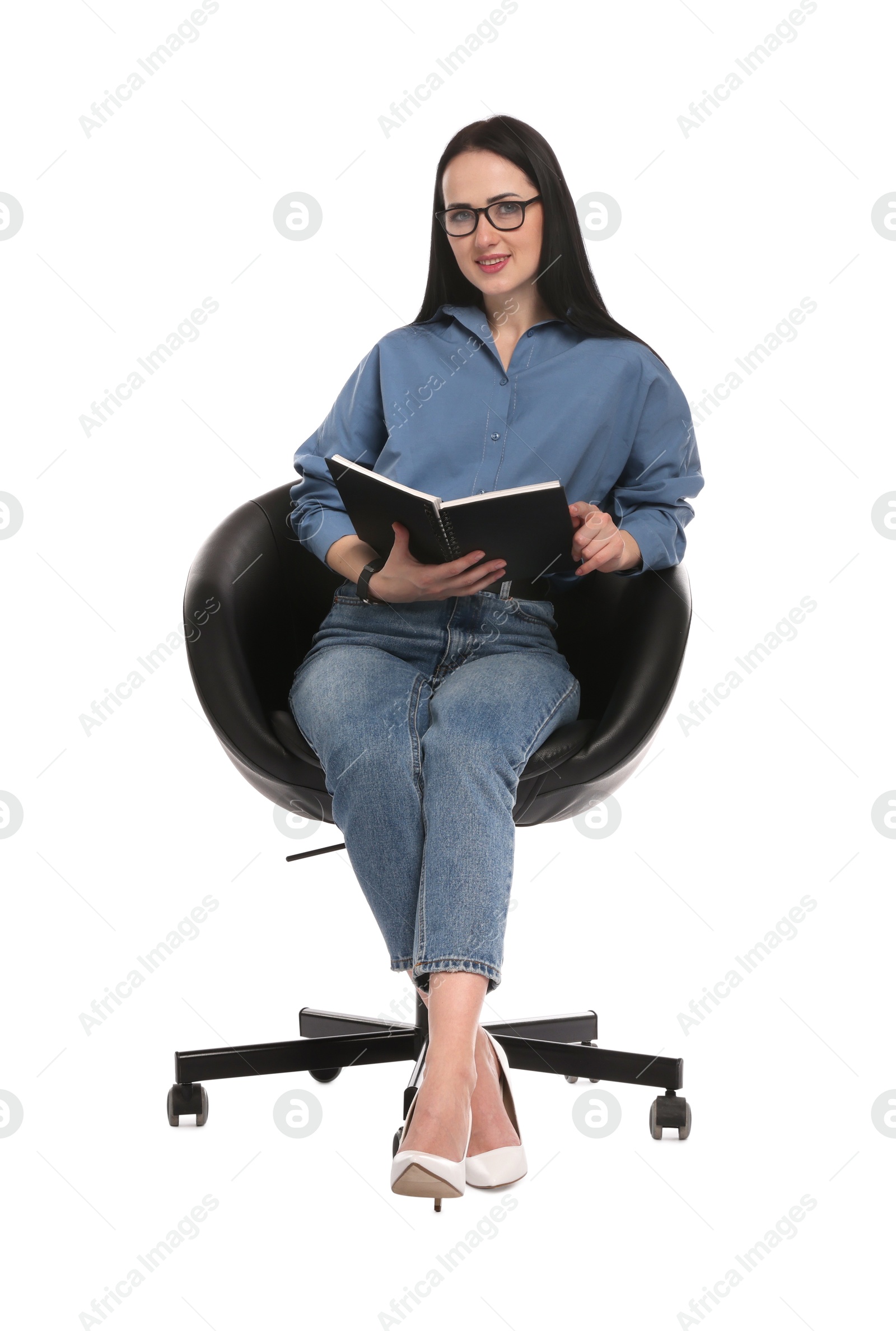 Professional psychologist with notebook in office chair on white background Photo of Professional psychologist with notebook in office chair on white background