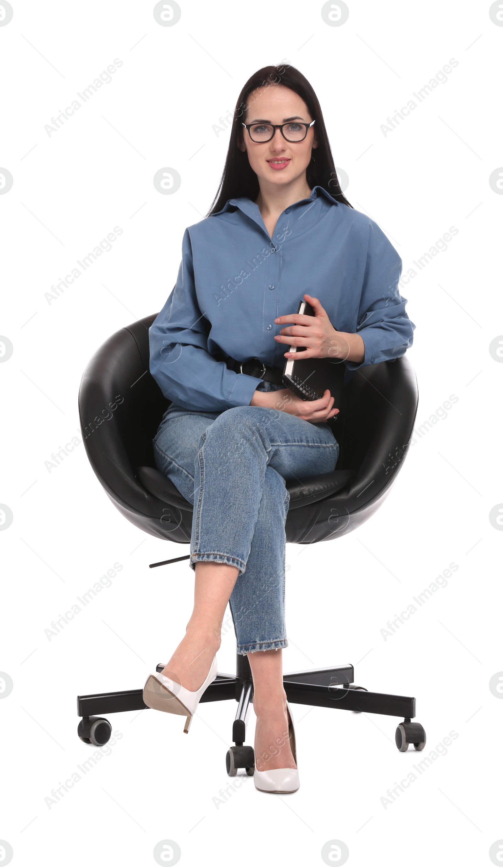 Professional psychologist with notebook in office chair on white background Photo of Professional psychologist with notebook in office chair on white background