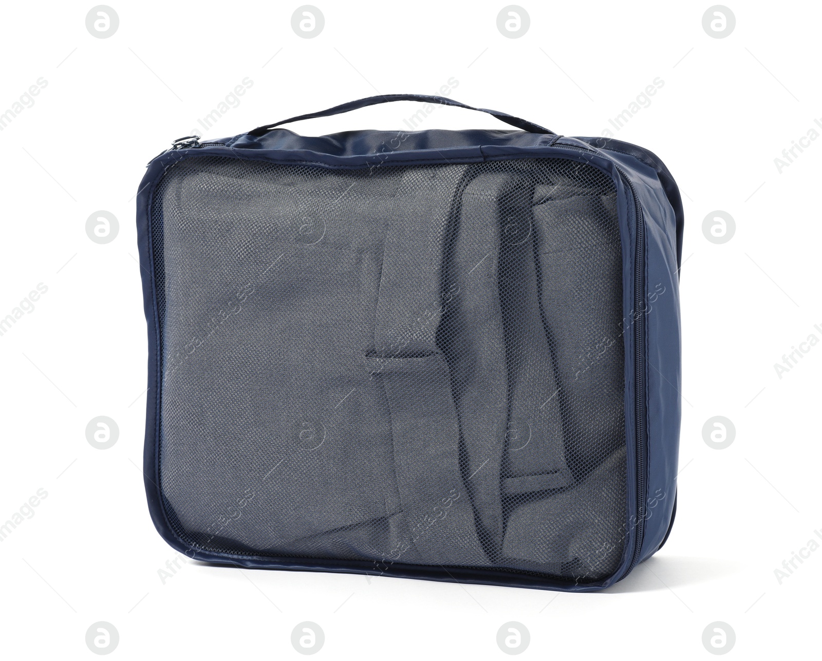 One packing cube with folded clothes isolated on white Photo of One packing cube with folded clothes isolated on white