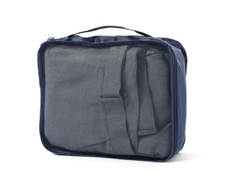 Photo of One packing cube with folded clothes isolated on white