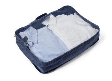 Photo of One packing cube with folded clothes isolated on white