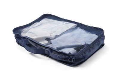 Photo of One packing cube with folded clothes isolated on white