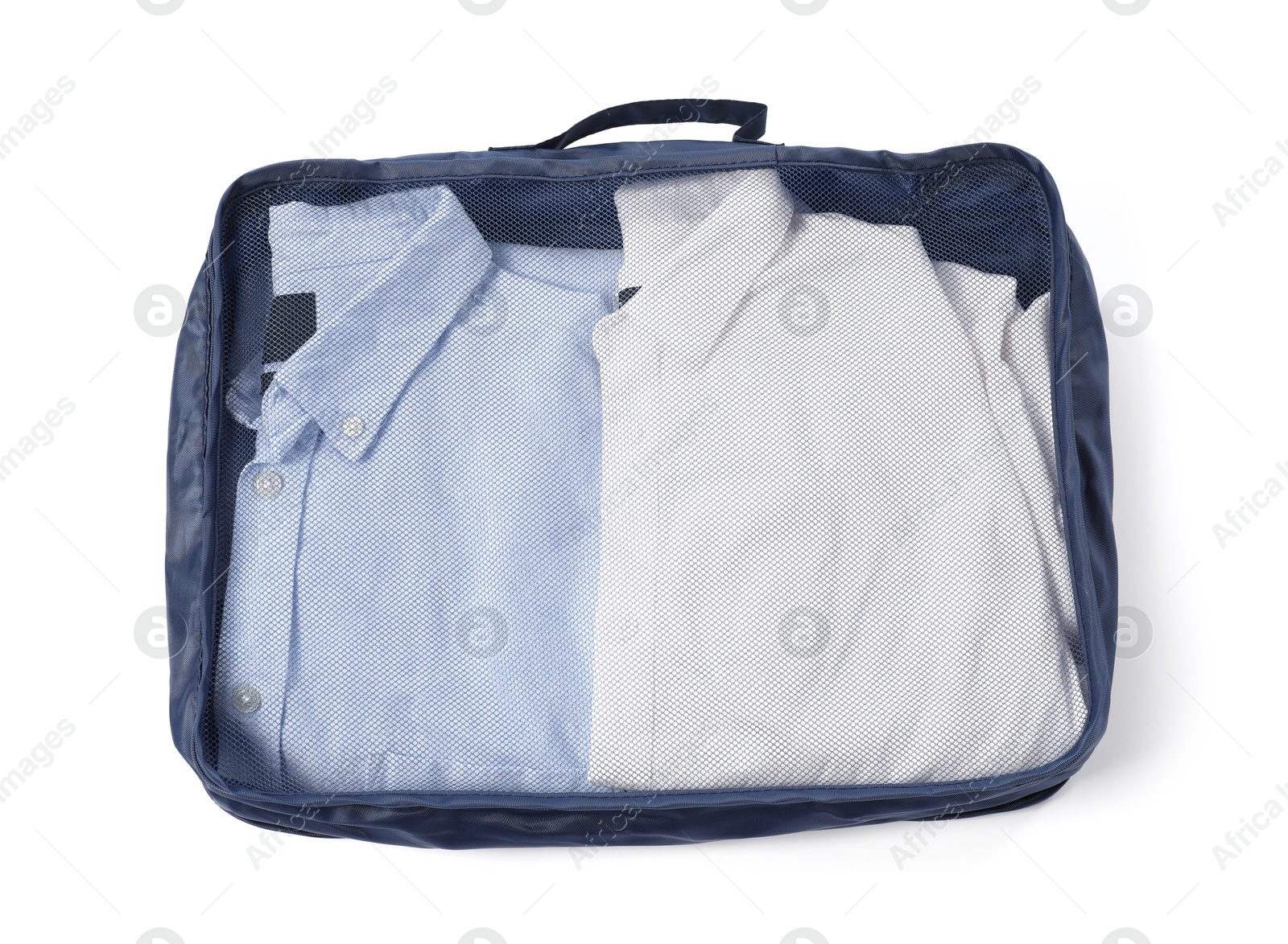 One packing cube with folded clothes isolated on white, top view Photo of One packing cube with folded clothes isolated on white, top view