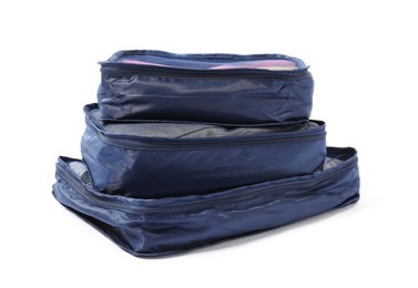 Photo of Stack of packing cubes isolated on white