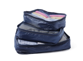Photo of Stack of packing cubes isolated on white