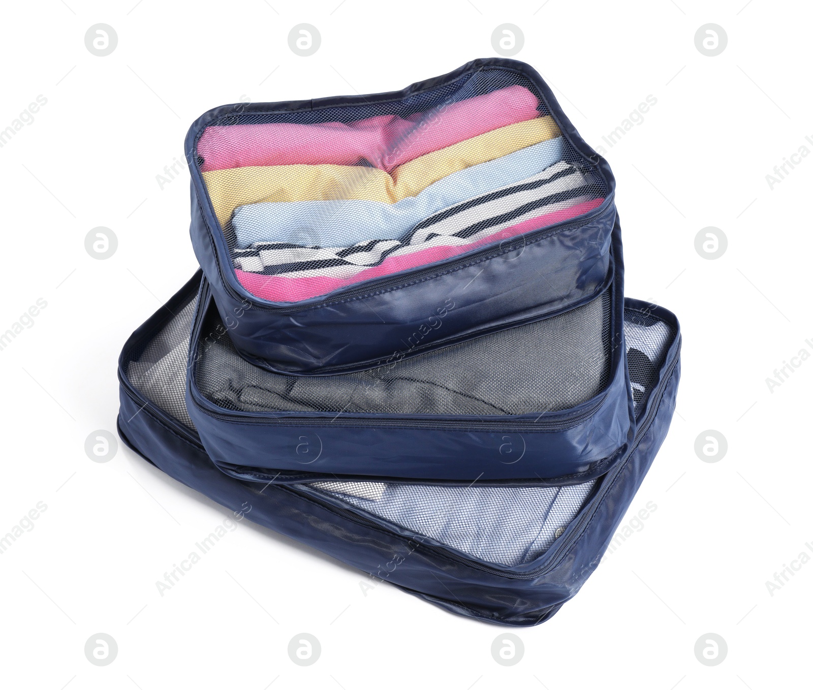 Stack of packing cubes isolated on white Photo of Stack of packing cubes isolated on white