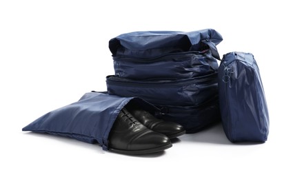 Photo of Blue packing cubes isolated on white. Storage organizer