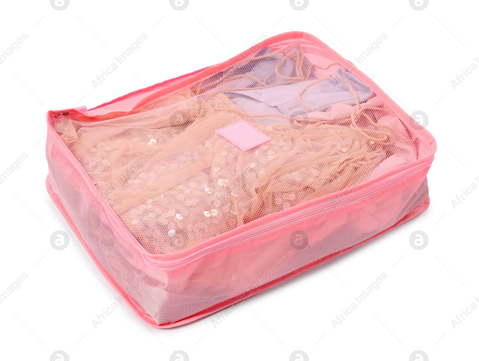 One packing cube with folded clothes isolated on white Photo of One packing cube with folded clothes isolated on white