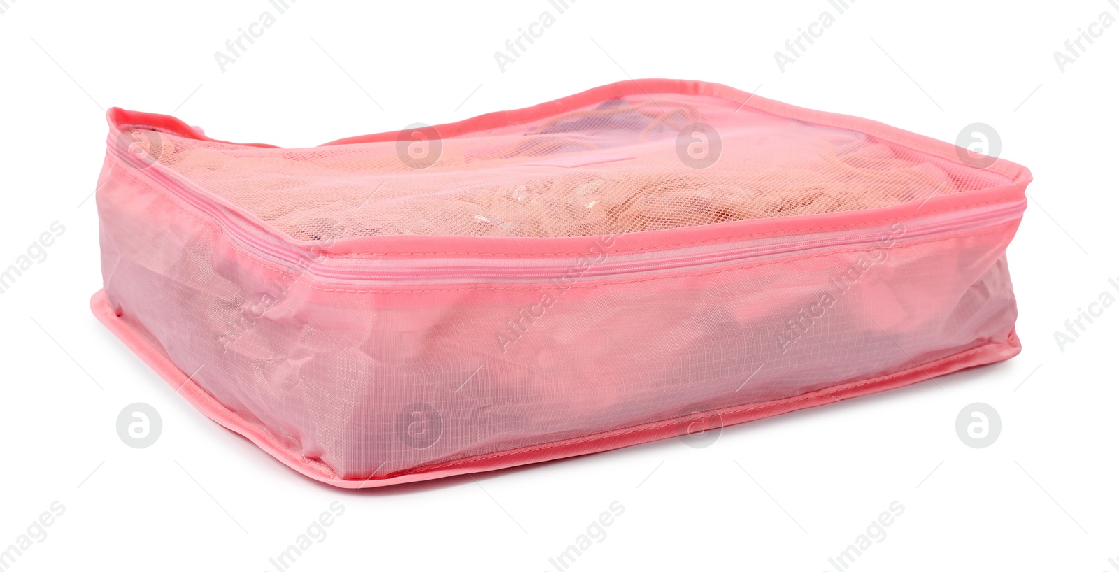 One packing cube with folded clothes isolated on white Photo of One packing cube with folded clothes isolated on white