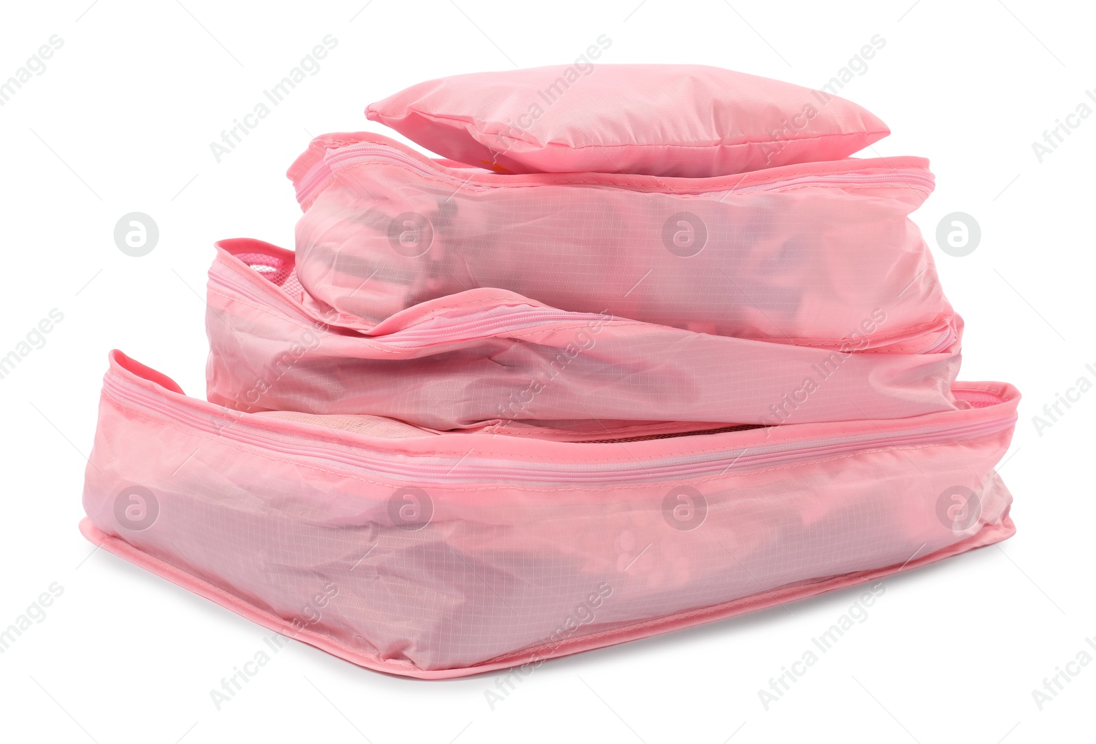 Stack of packing cubes isolated on white Photo of Stack of packing cubes isolated on white