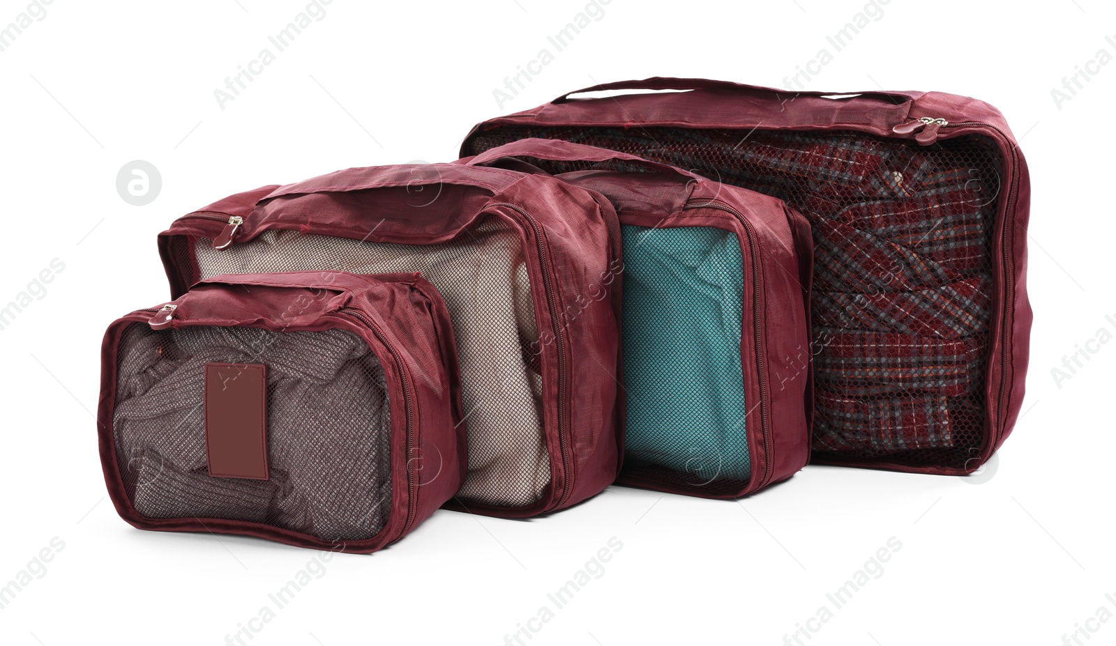 Brown packing cubes isolated on white. Storage organizer Photo of Brown packing cubes isolated on white. Storage organizer