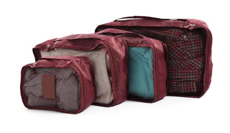 Photo of Brown packing cubes isolated on white. Storage organizer