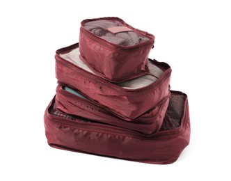 Photo of Stack of packing cubes isolated on white