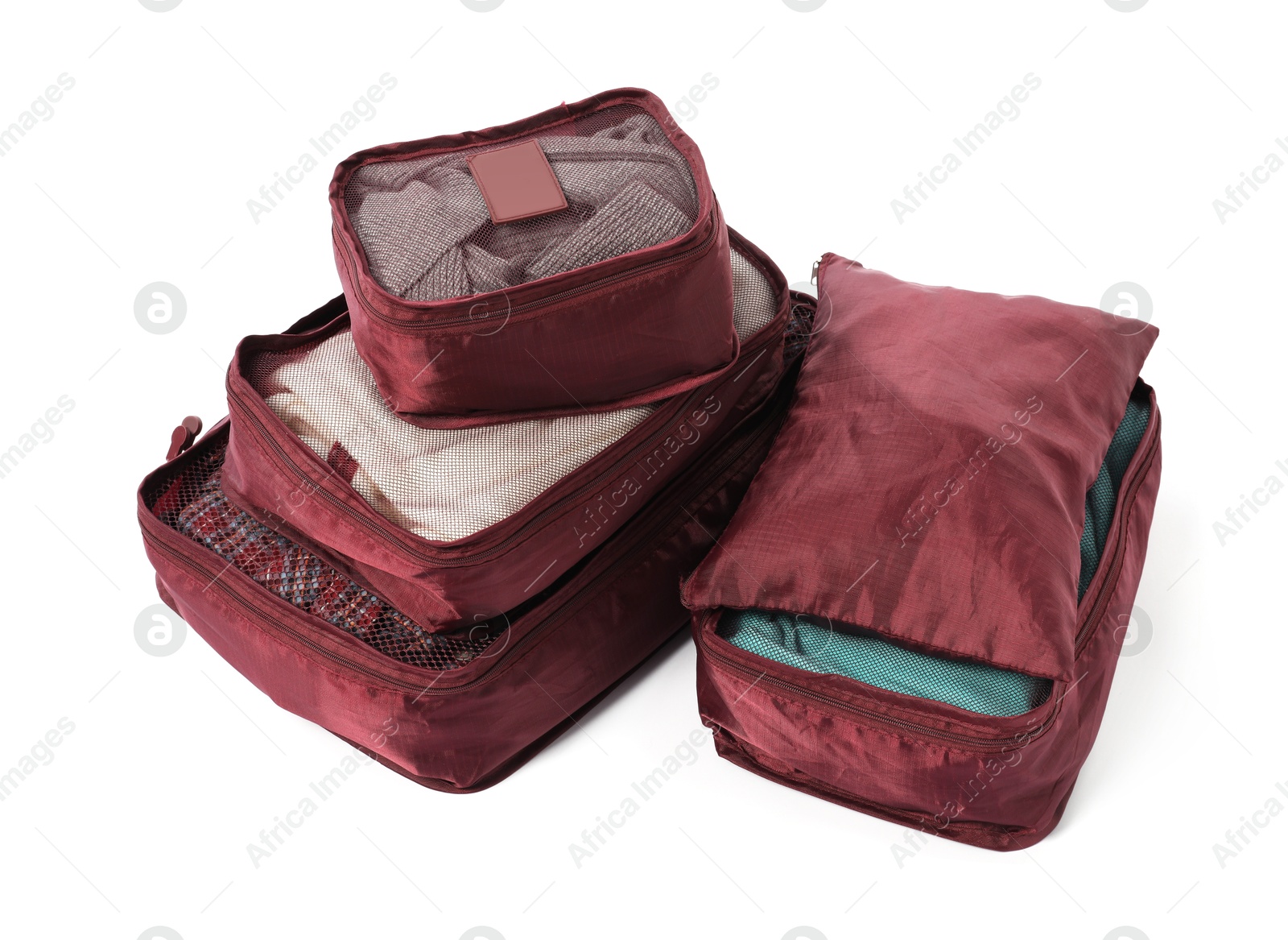 Brown packing cubes isolated on white. Storage organizer Photo of Brown packing cubes isolated on white. Storage organizer