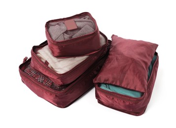 Photo of Brown packing cubes isolated on white. Storage organizer