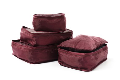 Photo of Brown packing cubes isolated on white. Storage organizer