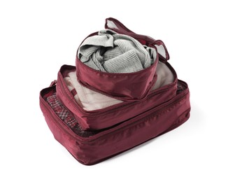 Photo of Stack of packing cubes isolated on white