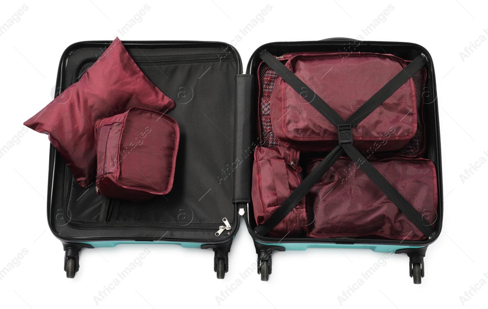 Open suitcase with packing cubes isolated on white, top view Photo of Open suitcase with packing cubes isolated on white, top view